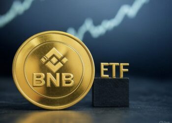 Moneda dorada de BNB con las letras ETF al lado.