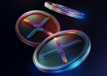 3 monedas de XRP sobre fondo negro.