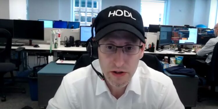 Un ejecutivo de VanEck en una entrevista por videollamada.