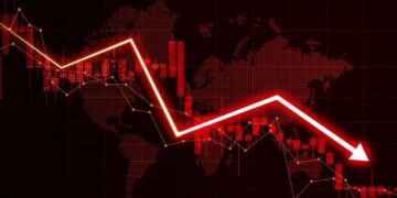 Una gran flecha de color rojo que simboliza la caída de precios del mercado.
