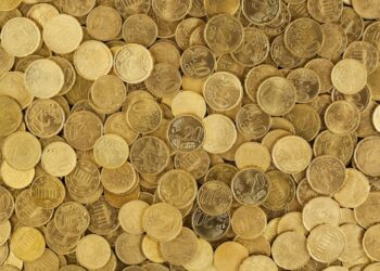 Imagen de moneas doradas de oro.