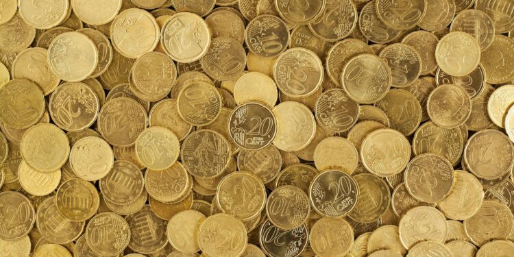 Imagen de moneas doradas de oro.