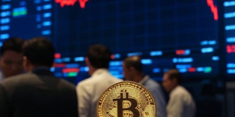 Gráfico de una moneda de bitcoin con un gráfico de fondo.