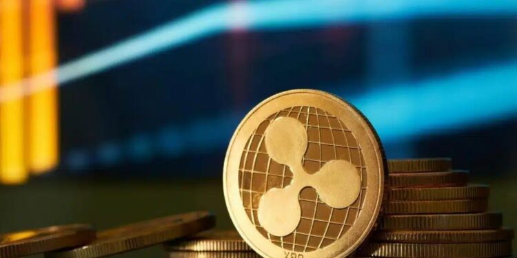 Una moneda dorada con el logo de Ripple Labs.