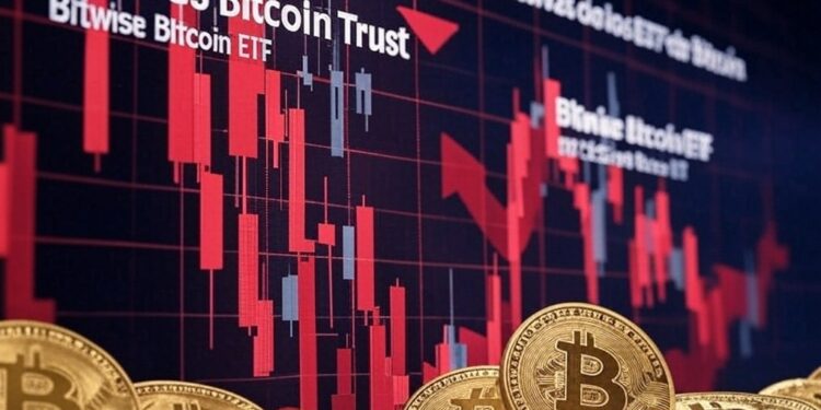 gráfico en rojo con monedas de bitcoin