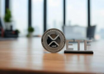 Moneda de XRP junto a las letras ETF.
