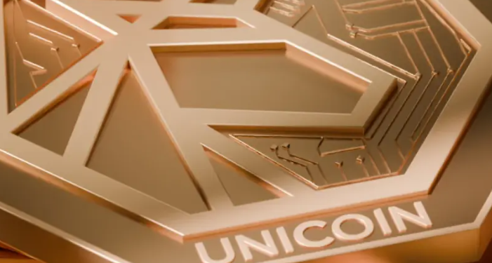 Imagen del token de Unicoin, empresa de tokenización de activos reales.