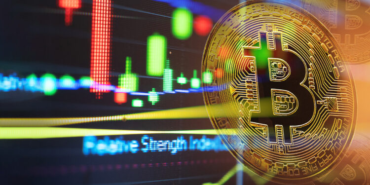 moneda de bitcoin sobre pantalla con grafico de precio digital