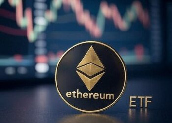 moneda de Ethereum con un gráfico de fondo.