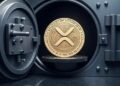 Una moneda dorada de XRP dentro de una bóveda.
