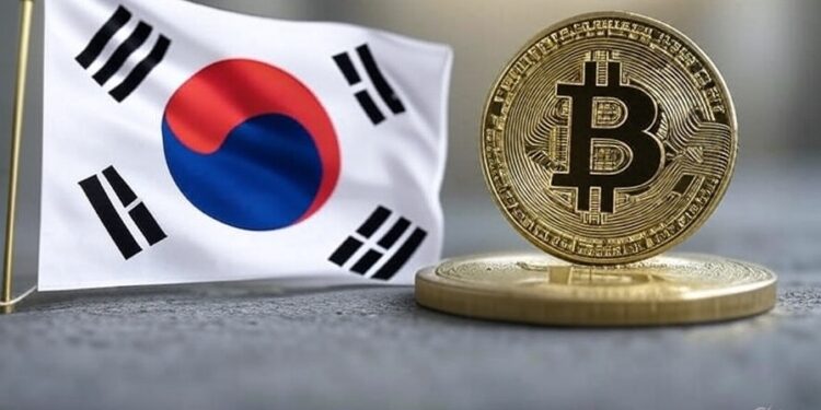 Una bandera de Corea del Sur junto a una moneda dorada de bitcoin.