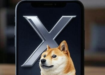 Un celular con el logo de X y un perro shiba inu.