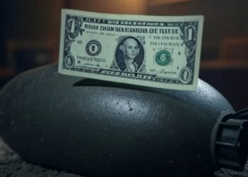 Dólar estadounidense sobre una bomba.