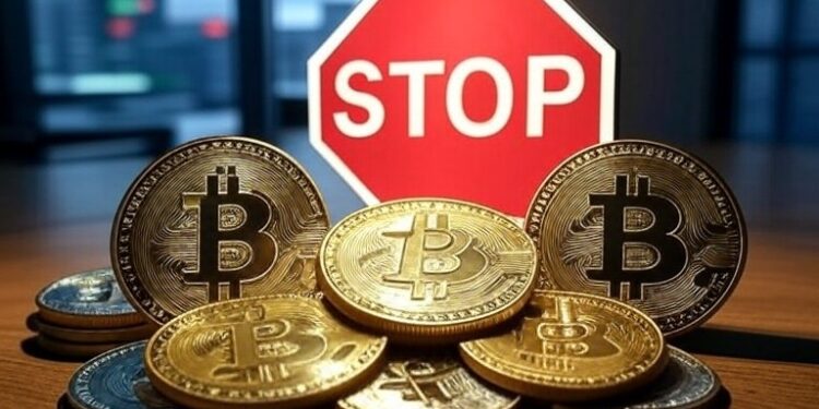 monedas de bitcoin y una señal de stop.