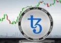 Una moneda de tezos junto con gráficos de precios.
