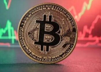 BTC entre gráficas verdes y rojas.