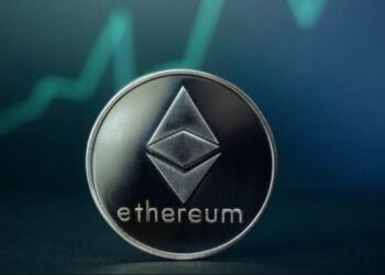 ETH con gráficas en el fondo.