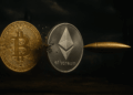 Grok: genera una imagen de una moneda de Bitcoin y una de Ethereum siendo perforadas por una bala de acero. Usa un estilo realista. El formato debe ser 16:9