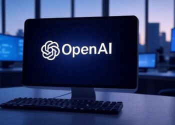 Grok: genera una imagen de una computadora con el logo de OpenAI. Usa un estilo futurista. El formato debe ser 16:9