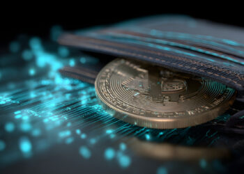 Billetera con una moneda de Bitcoin dentro, sobre circuítos de luz azul