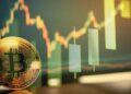 Bitcoin con gráficas de fondo.