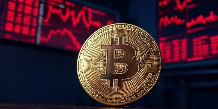 moneda de bitcoin dorada con un fondo de gráficos de precios en rojo.