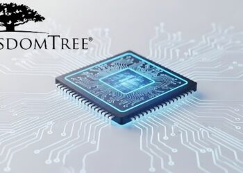 Un chip de computación cuántica junto al logo de WisdomTree.