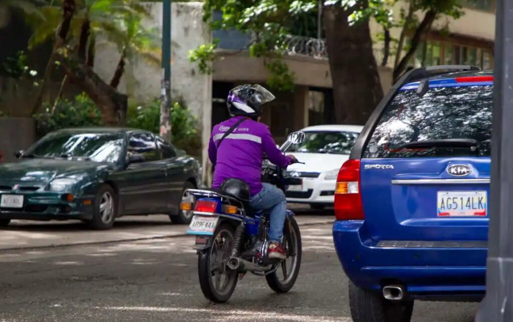Photograph of a Yummy Rides motorcycle taxi in Caracas.