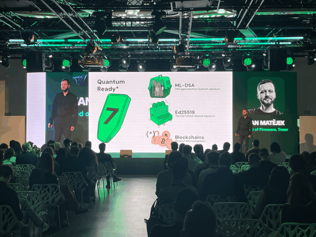 Trezor's Head of Firmware explaining Safe 7's QC capabilities in a digital display conference.