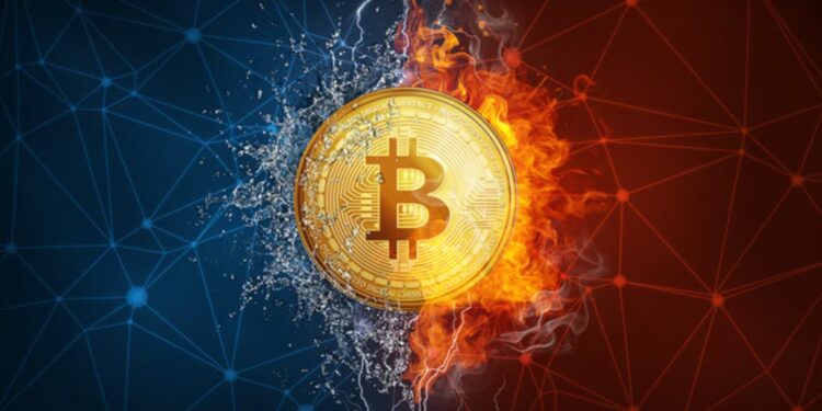 Moneda física de bitcoin dorada con fondo rojo y azul.
