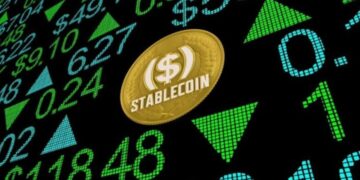 Una moneda digital que dice stablecoin sobre una pantalla digital con números.
