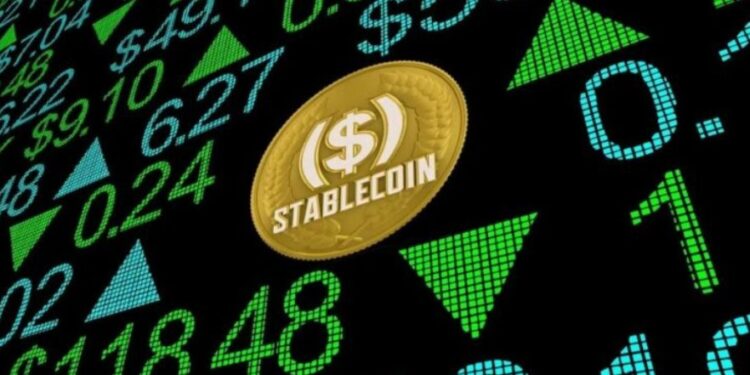 Una moneda digital que dice stablecoin sobre una pantalla digital con números.
