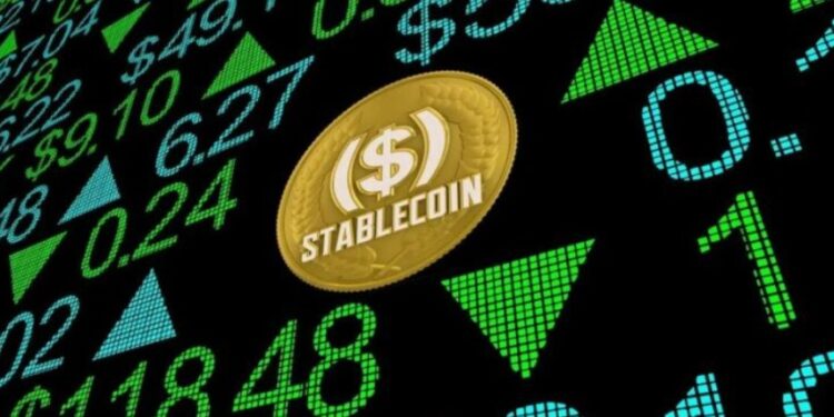 Moneda digital de stablecoin dispuesta sobre una pantalla digital.