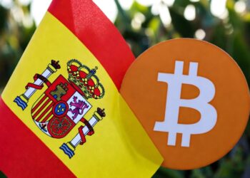 Bandera de España con el logo de BTC.