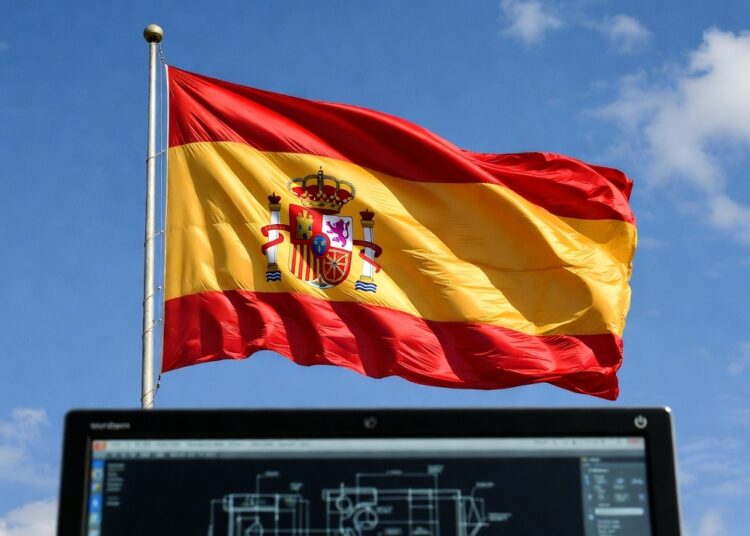 Bandera de España sobre un monitor al aire libre.