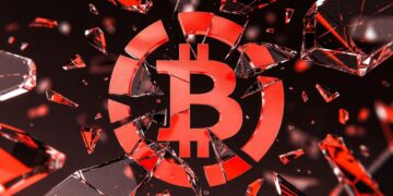 Logo de Bitcoin teñido en rojo y roto como si se tratara de un vidrio