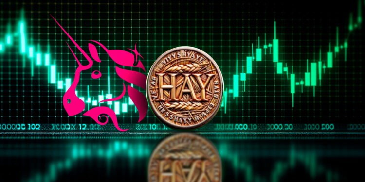 Una moneda física de haycoin delante de gráfico de precios y el logo de Uniswap.