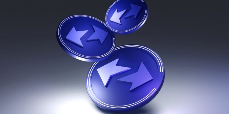 Monedas físicas azules cayendo.