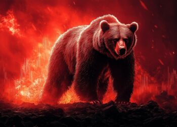 Oso delante de llamas de color rojo.