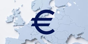 Símbolo del Euro en color azul oscuro frente a un mapa de europa en color azul claro.