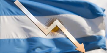 Flecha bajando y bandera de Argentina detrás