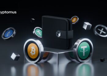 Criptomonedas de bitcoin y Tether sobre una mesa con un billetera negra sobre ellas.