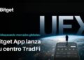 Banner de Bitget, lanza su centro de TradFi. A la derecha el planeta tierra, detrás UEX (Universal Exchange) delante la silueta de un hombre contemplando el mundo, parado sobre un celular gigante que tiene un balance de cuenta y tickers de activos, tanto cripto como tradicionales