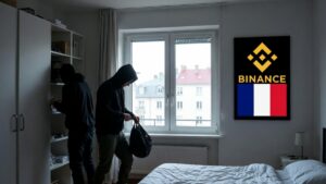 Ladrones encapuchados dentro de un apartamento que están robando, con recuadro con el logo de Binance y la bandera de Francia.