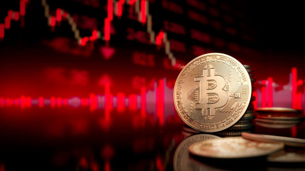 moneda de bitcoin con fondo de gráfico bursátil.