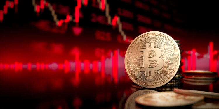 moneda de bitcoin con fondo de gráfico bursátil en rojo.