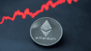 Una lรญnea roja encima de una moneda con el logo de Ethereum.