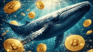Una ballena dentro el mar rodeada de monedas de bitcoin.