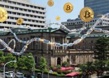 Edificio del Banco Central de Japón con monedas físicas de bitcoin doradas y cadenas de bloques alrededor.