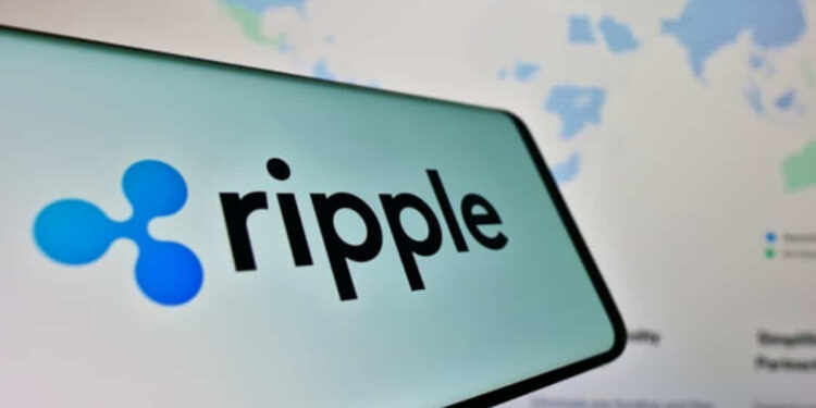 Teléfono inteligente que refleja el logo de Ripple.